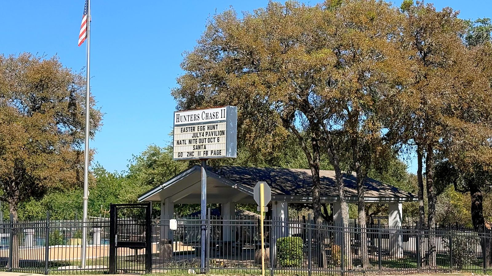 Hunters Chase II amenity center sign, covered pavilion and pool fence in San Antonio